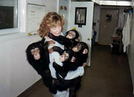 Nancy with four young chimpanzees